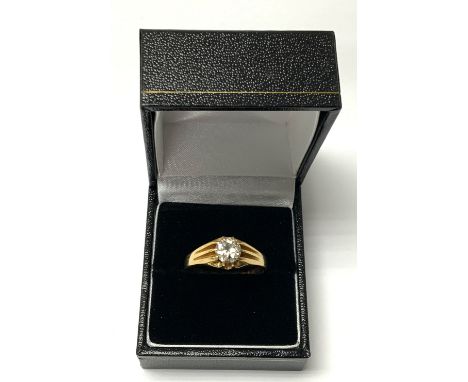A gents 18ct gold Gypsy style ring, inset with approximately 0.80ct solitare diamond. Size W, (A)