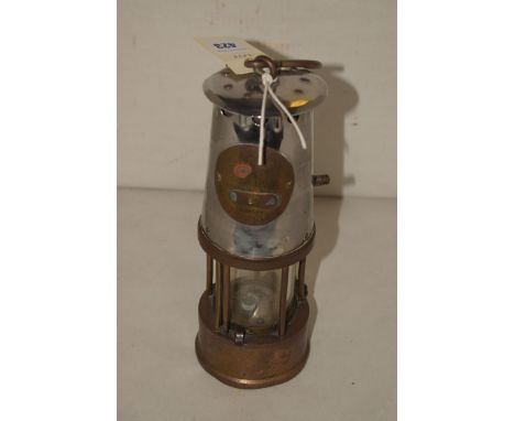 An Eccles mining lamp from the Protector Lamp & Lighting Co. Ltd no.B/28, brass base no. 55/3244