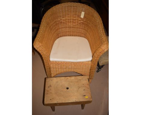 A 20th Century painted cracket stool; together with a cane conservatory chair.