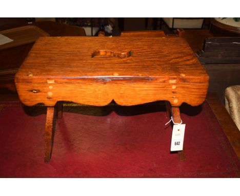 An early 20th Century oak cracket stool, 17in. wide.