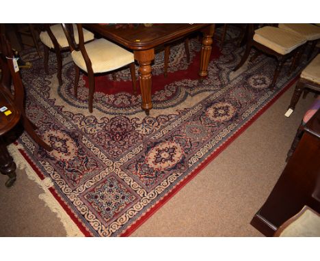 A super Kashan carpet on red ground, 365 x 274cms.