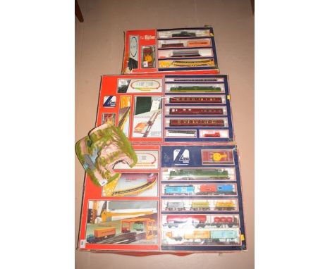 Lima Models: three 00-gauge train sets, to include: 4219; 10 1306 AW; 10 1857 AW, boxed (play worn); and a model tunnel.  (4)