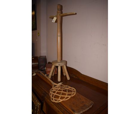 A 19th Century posstick; butter paddle; and a carpet beater.  (3)