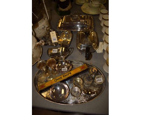 Silverplated metalware, to include; an entree dish, by Walker & Hall; a three-piece tea set; a condiment set; oval tray; napk