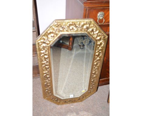 Wall mirror fitted bevelled glass.