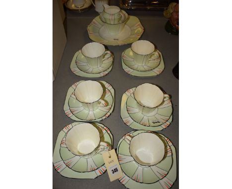 An art deco style Royal Albert Crown China part tea service, comprising: tea cups; saucers; tea plates; sandwich plates; crea