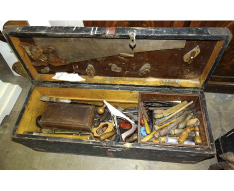 A painted wood tool chest, 91cm wide, 34cm high, 31cm deep, together with a collection of carpentry tools. 