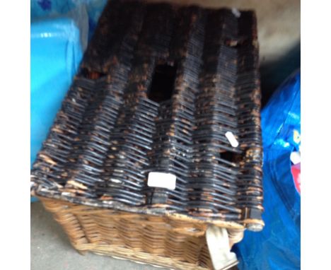 A WOVEN HAMPER BASKET