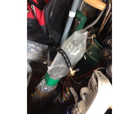 A BUNDLE OF TOOLS, DRAIN RODS ETC