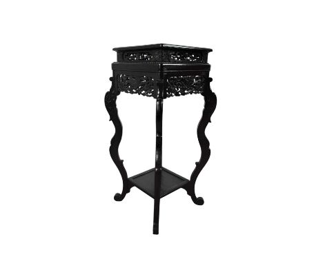 DARK STAINED HARDWOOD PLANT STAND, with pierced frieze of birds and foliage on shaped supports80cm high, 40cm wide