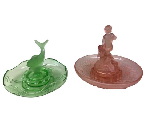 TWO ART DECO STYLE GLASS CENTREPIECES, each bowl with removable flower holder centres, one modelled as two figures, the other