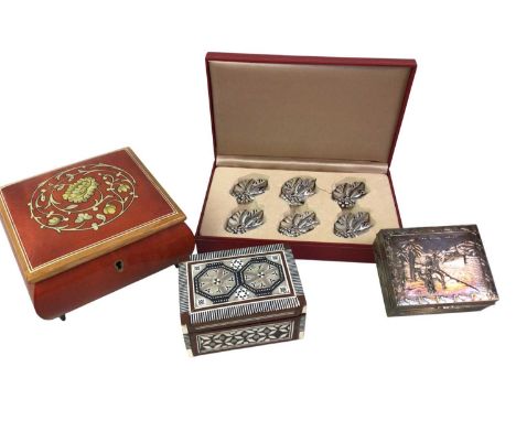 GROUP OF BOXES, AND A SET OF SIX WHITE METAL PLACE SETTING HOLDERS including cigar boxes, a musical jewellery box and further