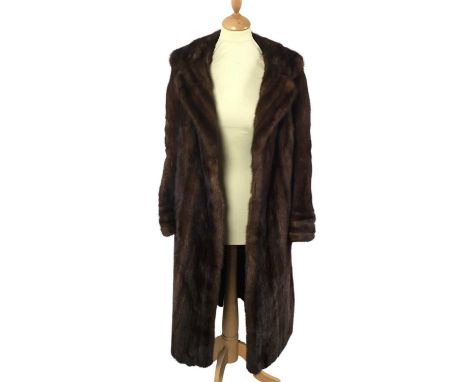 FUR COAT, AND A CAPE JACKET each by John Logan of GlasgowQty: 2Good fur condition to both, with no losses to collars and cuff