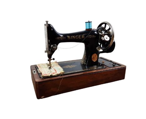 TWO SINGER SEWING MACHINES, cased