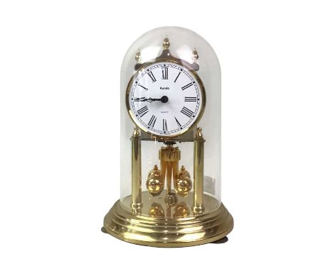 ANNIVERSARY CLOCK, AND OTHER ITEMS  comprising a brass bed warming pan and a brass kettleQty: 3