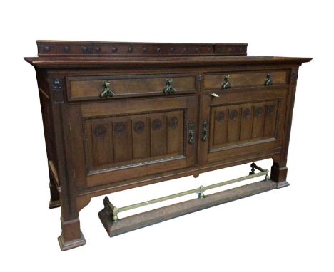 ART NOUVEAU MAHOGANY SIDEBOARD, with carved back panel, two drawers over two carved doors with brass handles and on square fe