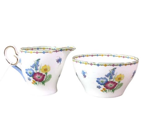 SHELLEY TEA SERVICE, WILD FLOWERS PATTERN  along with a Grosvenor twenty one piece tea service, each with floral and gilt dec
