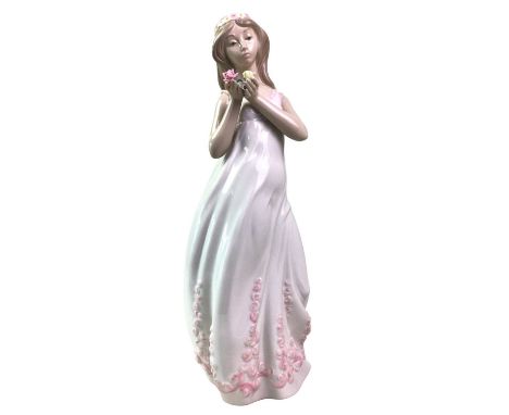 NAO 'WONDERFUL MOTHER' FIGURE, AND A COLLECTION OF ROYAL DOLTON FIGURES the large Nao figure depicting a woman in a long flow