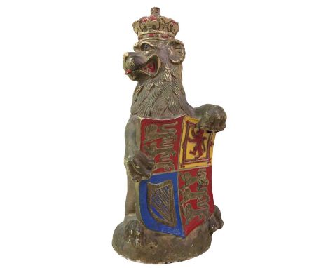 GILT LION WITH SHIELD, AND OTHER ITEMS  including a Maling vase and a photograph