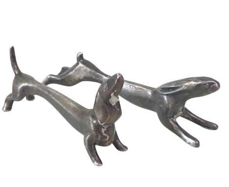 TWO KAYSERZINN ART NOUVEAU PEWTER KNIFE RESTS, AND OTHER ITEMS  the knife rests modelled as a dachshund and the other as a ha