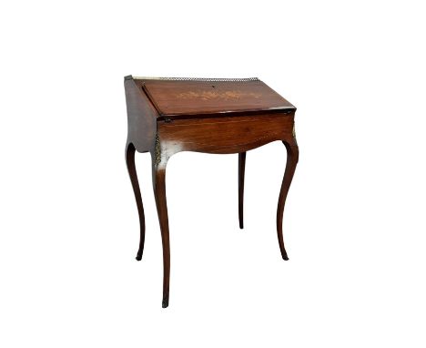 LATE VICTORIAN BUREAU DE DAME, with brass gallery and inlaid fall front enclosing fitted interiors with brass mounts, on shap