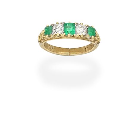 EMERALD AND DIAMOND RINGSet with alternating step-cut emeralds and old brilliant-cut diamonds, with rose-cut diamond accents,