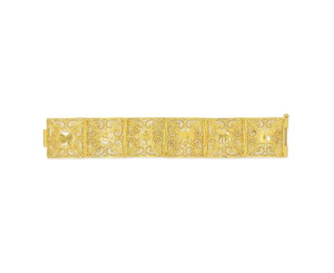 FILIGREE PANEL BRACELET, MID 20TH CENTURYEach panel applied with a differing central motif including an elephant, a camel and