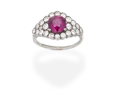 RUBY AND DIAMOND RINGThe oval-cut ruby within a navette-shaped surround of brilliant and single-cut diamonds, diamonds approx