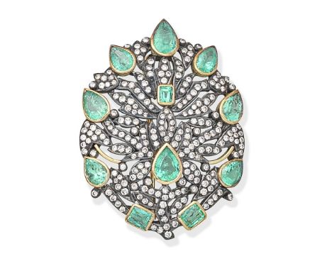 EMERALD AND DIAMOND-SET BROOCHThe openwork foliate plaque set with pear and step-cut emeralds and brilliant-cut diamonds,  di