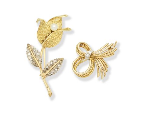 CULTURED PEARL AND DIAMOND-SET FLORAL BROOCH; DIAMOND-SET RIBBON BROOCH, CIRCA 19551st: The textured and polished flowerhead 