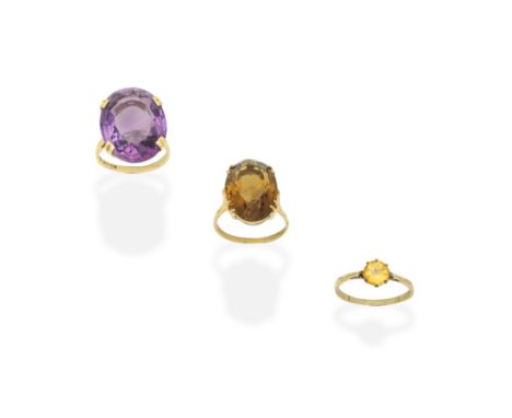 AMETHYST RING AND TWO CITRINE RINGS Amethyst and largest citrine ring both with UK hallmarks, ring sizes approx.: 1st K-L, 2n