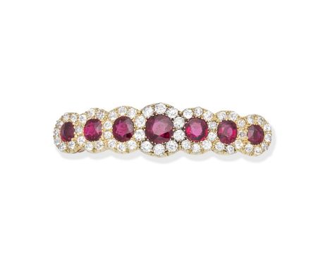 RUBY AND DIAMOND BROOCH, CIRCA 1880Designed as graduating oval-cut ruby and cushion-shaped diamond clusters, originally the f