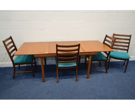 A MID TO LATE 20TH CENTURY TEAK RECTANGULAR TOP EXTENDING DINING TABLE, one additional fold out leaf, on oval legs, extended 