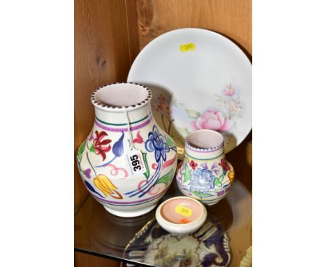 FOUR PIECES OF POOLE POTTERY, comprising two vases of shouldered baluster form, handpainted with flowers, printed and painted
