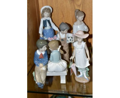 FIVE NAO FIGURES/GROUP, comprising boxed 'April Showers' No 1126, height 19cm, boxed figure group 'First Love' No 1136, width