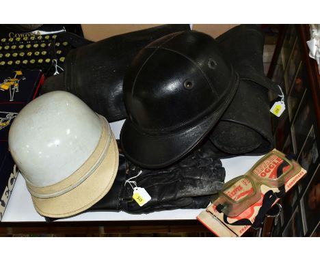 A QUANTITY OF VINTAGE MOTORCYCLE CLOTHING, a J Compton, Sons &amp; Webb Lts, 'The Corker' helmet, a Stadium  helmet (made of 