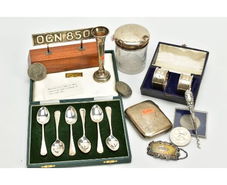 A BOX OF SILVER ITEMS, to include a cased set of two, engine turn designed napkin rings with vacant cartouches, hallmarked Bi