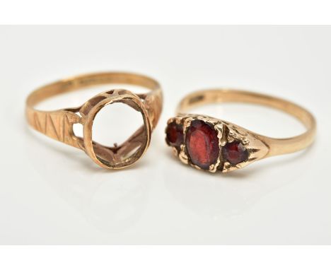 TWO 9CT GOLD RINGS, the first a graduated three stone oval cut garnet ring, within a scroll detailed gallery, hallmarked 9ct 