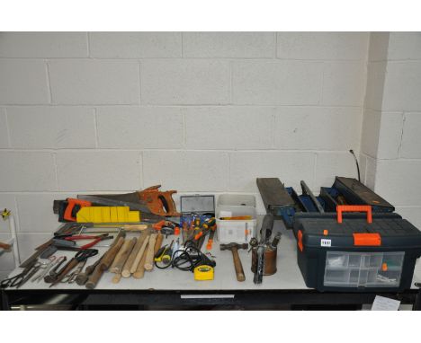 TWO TOOL BOXES AND A TIN TRUNK CONTAINING HAND TOOLS, including Spear and Jackson, among other, saws, hammers, hammer shafts,