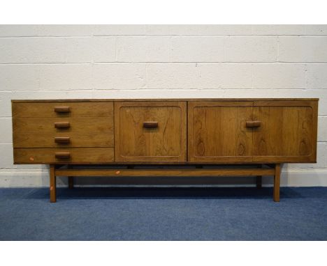 BATH CABINET MAKERS, BCM, a 7ft rosewood sideboard, four drawers to the left side, the top drawer with cutlery dividers and b