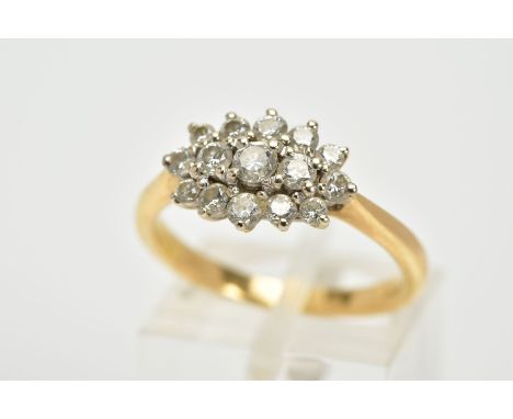 AN 18CT GOLD DIAMOND CLUSTER RING, the cluster of an oval form, set with fifteen graduated round brilliant cut diamonds, tape