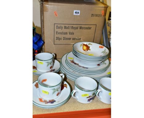 A BOXED ROYAL WORCESTER EVESHAM VALE TWENTY PIECE DINNER SERVICE, (4 place settings), purchased from a Daily Mail offer, look