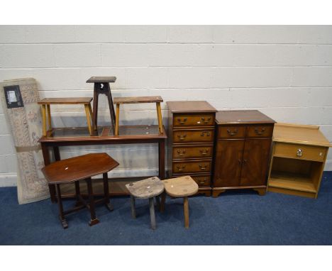 A QUANTITY OF OCCASIONAL FURNITURE, to include two yewwood hi fi cabinets, mahogany and glass hall table, light oak bedside c