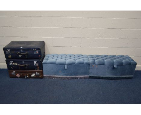 THREE VINTAGE SUITCASES, together with two blue upholstered ottomans (5)