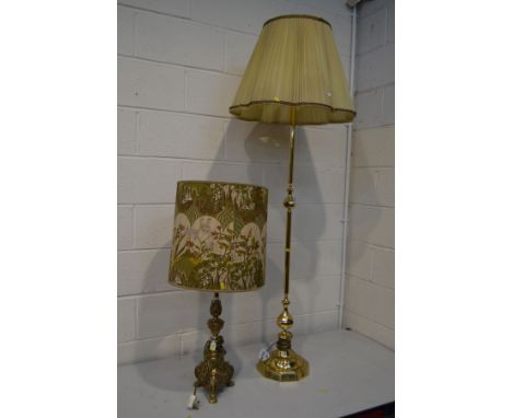 AN ELABORATE BRASS TABLE LAMP with a cylindrical Morris &amp; Co style shade together with a brass standard lamp with a fabri