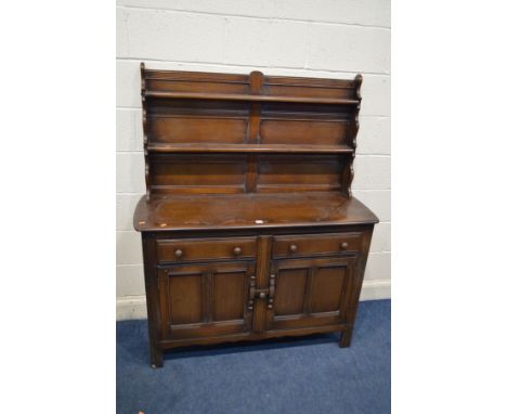 A DARK ERCOL DRESSER with two drawers, width 124cm x depth 46cm x height 151cm