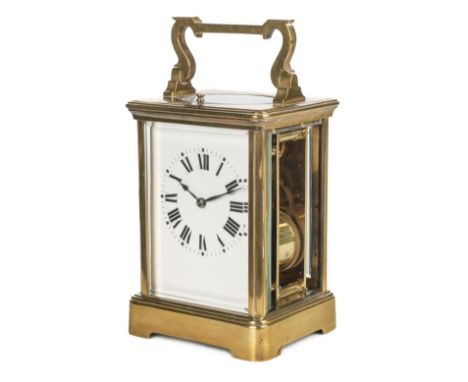 * Timepiece. French brass carriage clock circa 1880, the white enamel dial with black roman numerals and blued steel hands, t