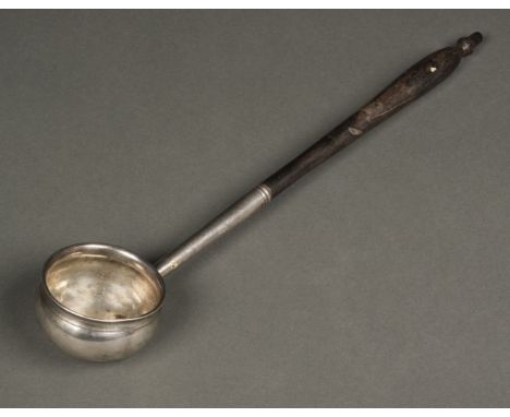 * Toddy Ladle. A George II Irish silver toddy ladle, makers mark obscured, Dublin circa 1725, of plain form with rosewood han