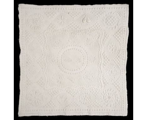 * Quilts. Two boutis petassoun quilts, France, mid 19th century, 2 small square infant lap quilts of hand-quilted white cotto