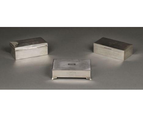 * Cigarette Boxes. Silver cigarette box by Roberts &amp; Dore, Birmingham 1966, of rectangular form, the heavy gauge lid with
